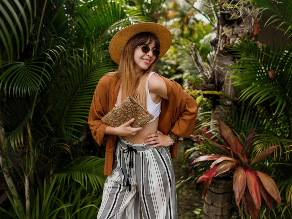 fashion image sexy graceful woman straw hat posing tropical palm leaves